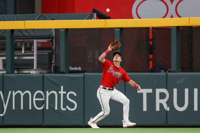 Apr 7, 2023; Atlanta, Georgia, USA; Atlanta Braves center fielder Sam Hilliard (14) catches a fly ball against the San Diego Padres in the third inning at Truist Park. Mandatory Credit: Brett Davis-USA TODAY Sports